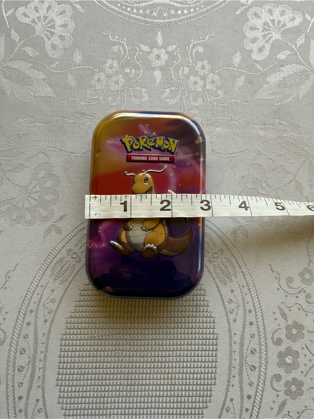 Pokemon Mini Tin Case with Yellow Dragonite and Purple-Orange Gradient